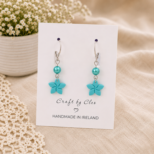 Forget Me Not polymer clay earrings with pearl accent.